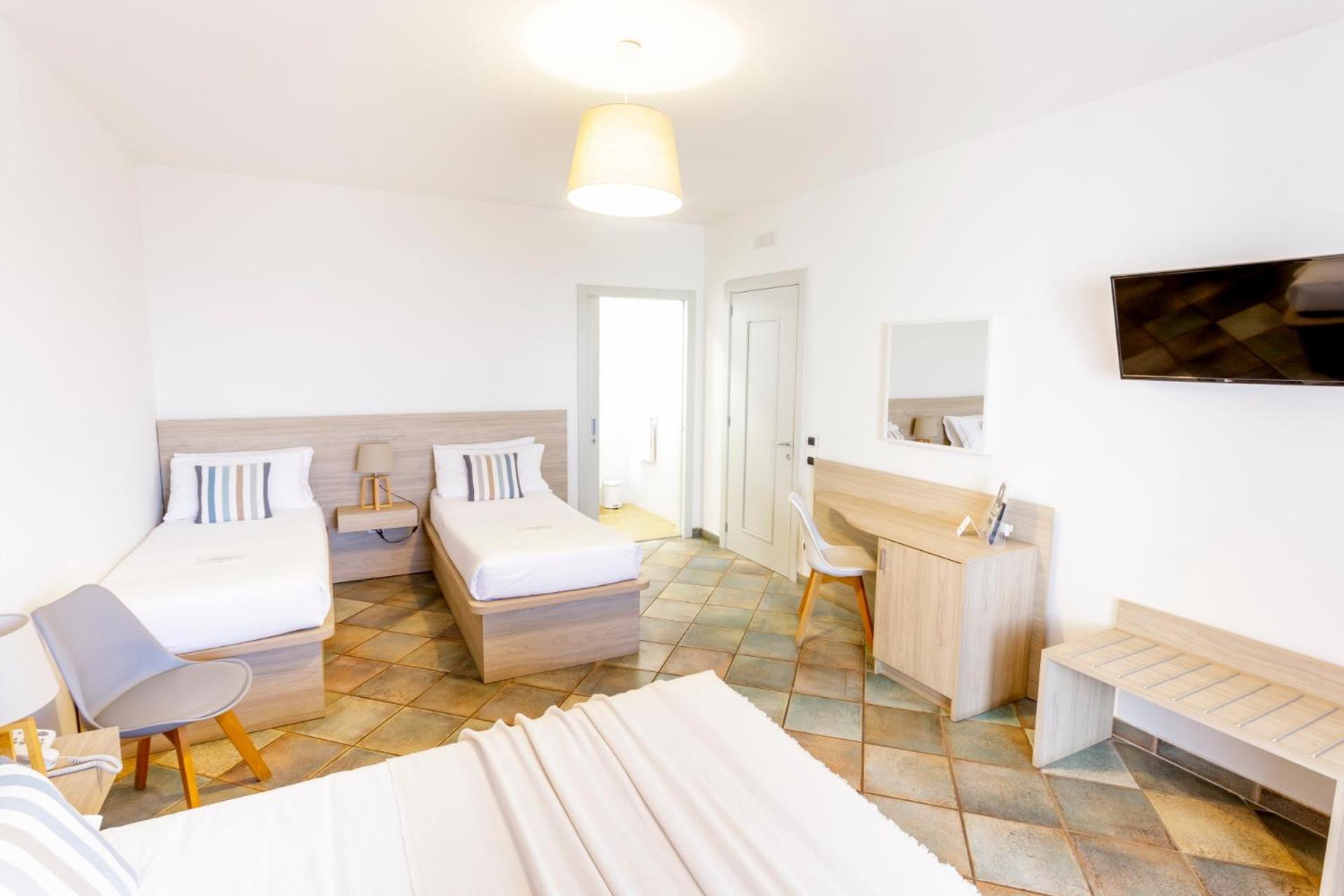 Hotel Corallo Santa Maria al Bagno Pokoj fotografie