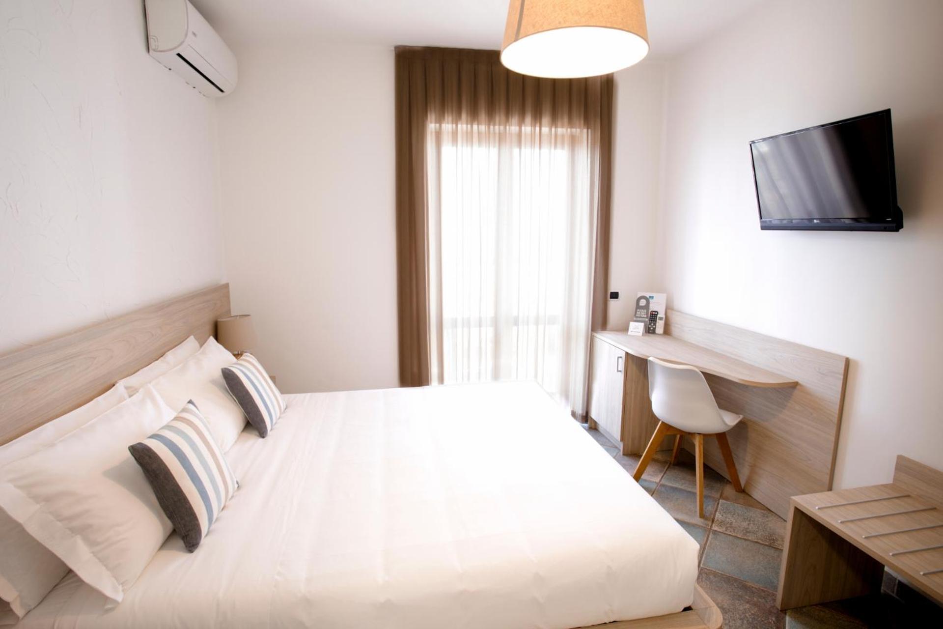 Hotel Corallo Santa Maria al Bagno Pokoj fotografie